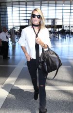 ROSIE HUNTINGTON-WHITELEY Arrives at Los Angeles International Airport 09/13/2015