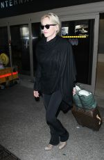 SHARON STONE at LAX Airport in Los Angeles 09/20/2015