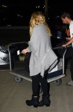 ALICE EVE at Los Angeles International Airport 10/06/2015