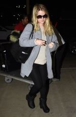 ALICE EVE at Los Angeles International Airport 10/06/2015