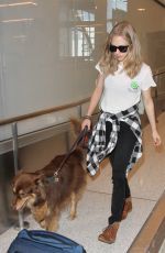 AMANDA SEYFRIE and Finn at LAX Airport in Los Angeles 10/13/2015