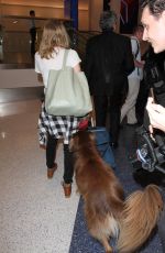 AMANDA SEYFRIE and Finn at LAX Airport in Los Angeles 10/13/2015