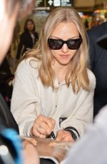 AMANDA SEYFRIED at Narita International Airport in Tokyo 10/08/2015