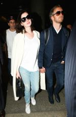 ANNE HATHAWAY at Los Angeles International Airport 09/30/2015