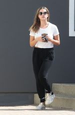 ASHLEY BENSON Leaves an Office Building in Los Angeles 10/13/2015