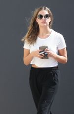 ASHLEY BENSON Leaves an Office Building in Los Angeles 10/13/2015