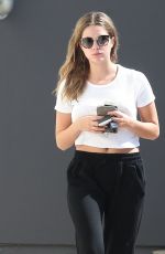 ASHLEY BENSON Leaves an Office Building in Los Angeles 10/13/2015