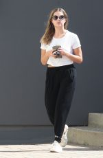 ASHLEY BENSON Leaves an Office Building in Los Angeles 10/13/2015
