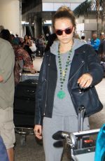 CARA DELEVINGNE Arrives at LAX Airport in Los Angeles 10/14/2015
