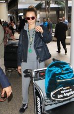 CARA DELEVINGNE Arrives at LAX Airport in Los Angeles 10/14/2015