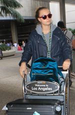 CARA DELEVINGNE Arrives at LAX Airport in Los Angeles 10/14/2015
