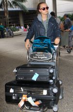 CARA DELEVINGNE Arrives at LAX Airport in Los Angeles 10/14/2015