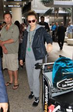 CARA DELEVINGNE Arrives at LAX Airport in Los Angeles 10/14/2015