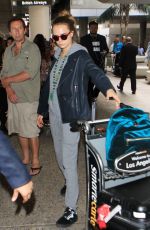CARA DELEVINGNE Arrives at LAX Airport in Los Angeles 10/14/2015