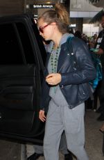 CARA DELEVINGNE Arrives at LAX Airport in Los Angeles 10/14/2015