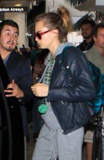 CARA DELEVINGNE Arrives at LAX Airport in Los Angeles 10/14/2015