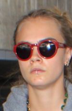 CARA DELEVINGNE Arrives at LAX Airport in Los Angeles 10/14/2015