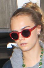 CARA DELEVINGNE Arrives at LAX Airport in Los Angeles 10/14/2015