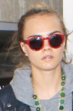 CARA DELEVINGNE Arrives at LAX Airport in Los Angeles 10/14/2015