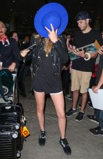CARA DELEVINGNE Arrives at Los Angeles International Airport 10/21/2015