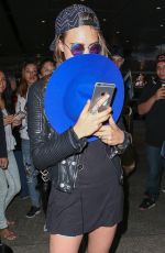 CARA DELEVINGNE Arrives at Los Angeles International Airport 10/21/2015