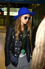CARA DELEVINGNE at Charles De Gaulle Airport in Paris 10/19/2015
