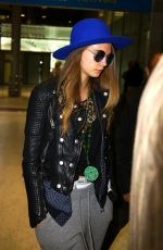CARA DELEVINGNE at Charles De Gaulle Airport in Paris 10/19/2015