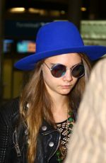 CARA DELEVINGNE at Charles De Gaulle Airport in Paris 10/19/2015