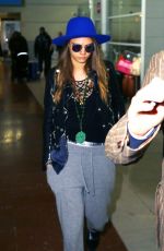 CARA DELEVINGNE at Charles De Gaulle Airport in Paris 10/19/2015