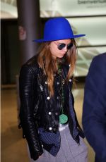 CARA DELEVINGNE at Charles De Gaulle Airport in Paris 10/19/2015