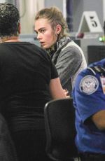 CARA DELEVINGNE at LAX Airport in Los Angeles 10/28/2015