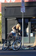 CHLOE SEVIGNY in Denim Shorts Riding a Bike Out in Venice 10/28/2015