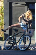 CHLOE SEVIGNY in Denim Shorts Riding a Bike Out in Venice 10/28/2015
