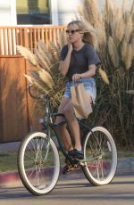 CHLOE SEVIGNY in Denim Shorts Riding a Bike Out in Venice 10/28/2015