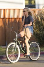 CHLOE SEVIGNY in Denim Shorts Riding a Bike Out in Venice 10/28/2015