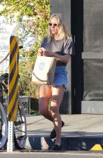 CHLOE SEVIGNY in Denim Shorts Riding a Bike Out in Venice 10/28/2015
