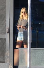 CHLOE SEVIGNY in Denim Shorts Riding a Bike Out in Venice 10/28/2015