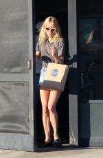 CHLOE SEVIGNY in Denim Shorts Riding a Bike Out in Venice 10/28/2015
