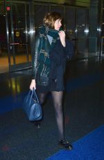 DAKOTA JOHNSON Arrives at JFK Airport in New York 10/18/2015