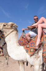 DANIELLA WESTBROOK in Bikini Riding a Camel in Egypt