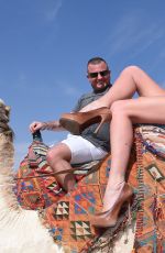 DANIELLA WESTBROOK in Bikini Riding a Camel in Egypt