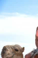 DANIELLA WESTBROOK in Bikini Riding a Camel in Egypt