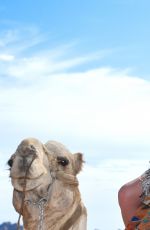 DANIELLA WESTBROOK in Bikini Riding a Camel in Egypt