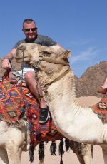 DANIELLA WESTBROOK in Bikini Riding a Camel in Egypt