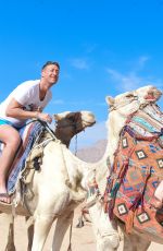 DANIELLA WESTBROOK in Bikini Riding a Camel in Egypt
