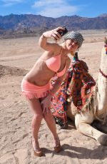 DANIELLA WESTBROOK in Bikini Riding a Camel in Egypt