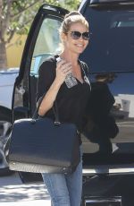 DENISE RICHARDS Arrives at a Skin Care Clinic in Beverly Hills 10/29/2015