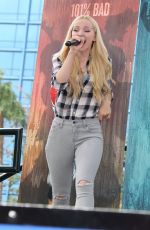 DOVE CAMERON at Descendants Stars at Downtown Disney in Anaheim 10/17/2015