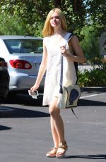 ELLE FANNING Out and About in Hollywood 10/08/2015