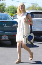 ELLE FANNING Out and About in Hollywood 10/08/2015